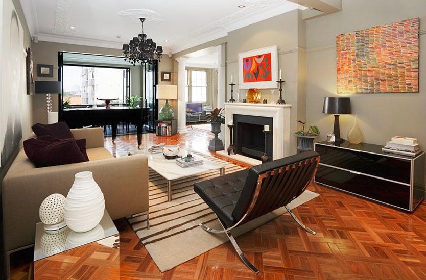 Restored living room and original architectural details at The Manar